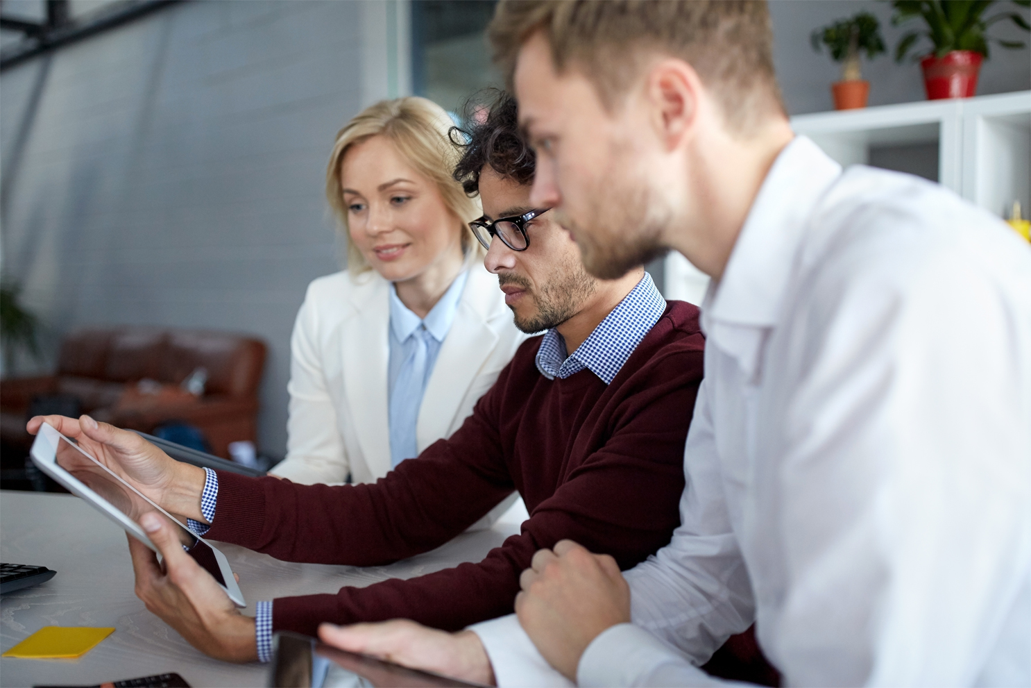 business-team-with-tablet-pc-at-office.jpg